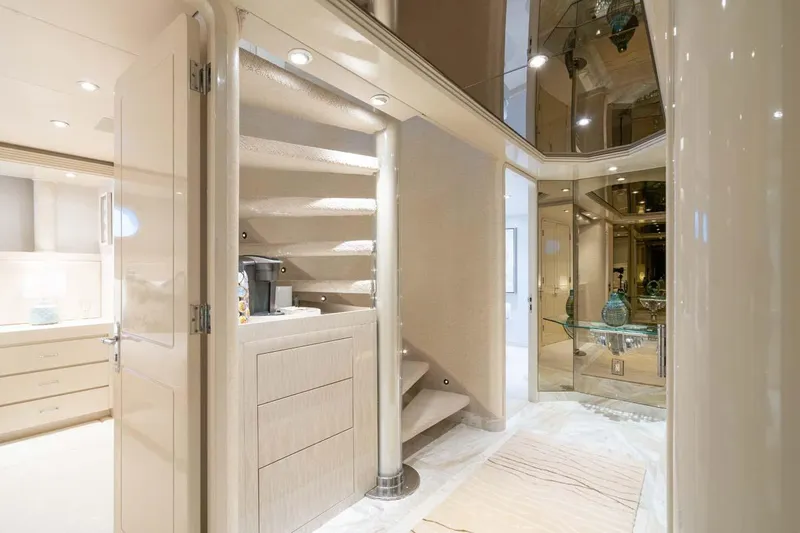 Cupcake Yacht Photos Pics Luxurious interior of 2001 Westship Skylounge yacht with elegant staircase and modern decor.