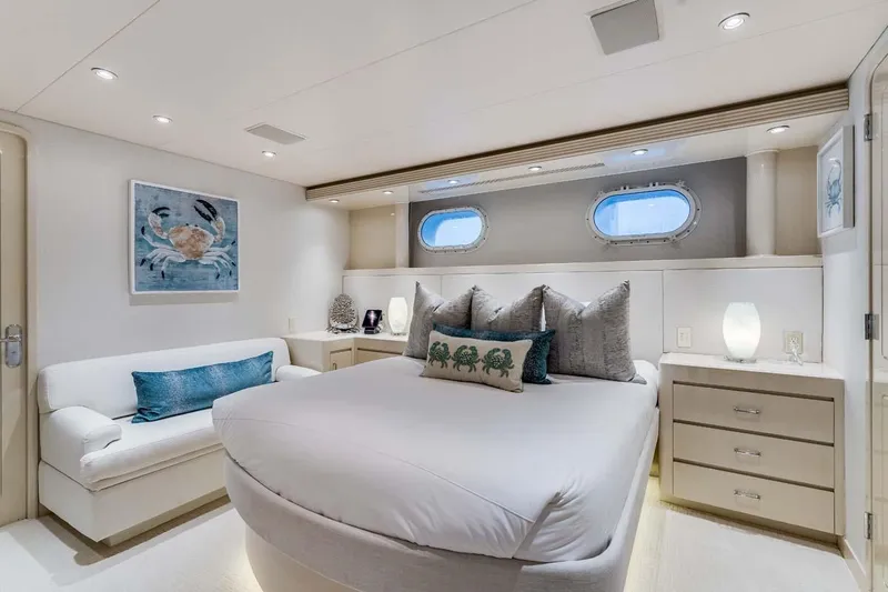 Cupcake Yacht Photos Pics Luxurious 2001 Westship Skylounge yacht bedroom with elegant decor and ocean-themed artwork.