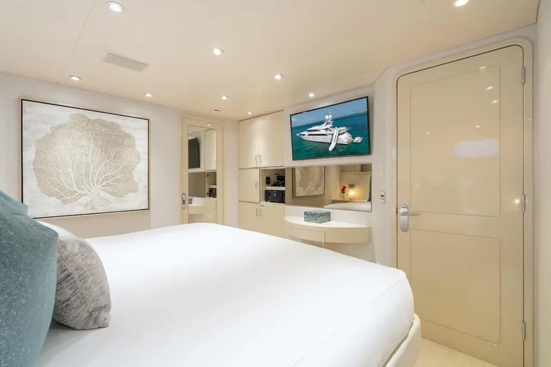 Cupcake Yacht Photos Pics Luxurious bedroom interior of 2001 Westship Skylounge yacht with modern decor and wall art.