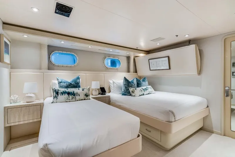 Cupcake Yacht Photos Pics Luxurious 2001 Westship Skylounge yacht bedroom with twin beds and elegant decor.