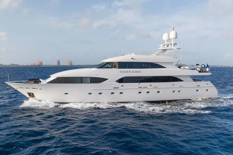 Cupcake Yacht Photos Pics Luxury 2001 Westship Skylounge yacht cruising on open water.