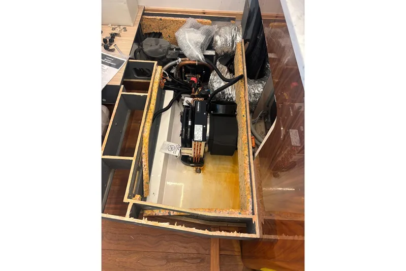 Atkun Yacht Photos Pics Engine compartment of 2021 Sunseeker Manhattan 68 yacht, showcasing internal components.