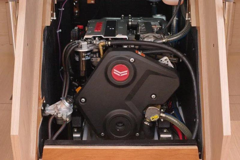  Yacht Photos Pics Engine compartment of 2022 Beneteau Oceanis Yacht 54, showcasing detailed mechanical components.