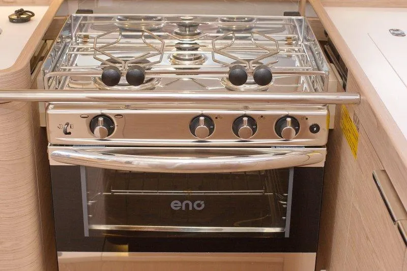  Yacht Photos Pics Stainless steel stove and oven in 2022 Beneteau Oceanis Yacht 54 kitchen.