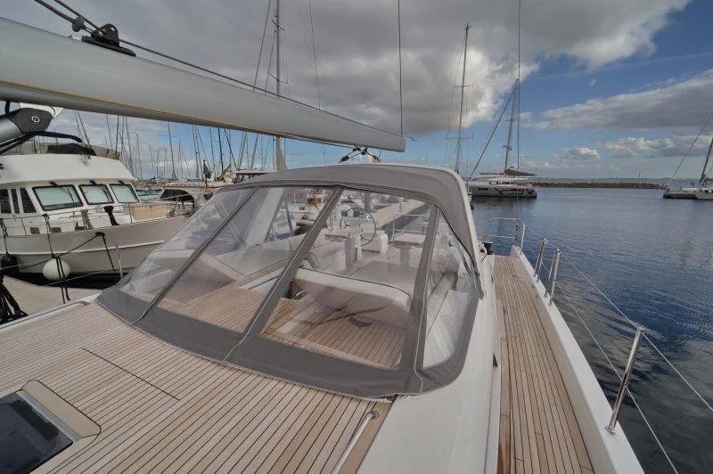  Yacht Photos Pics 2022 Beneteau Oceanis Yacht 54 docked, showcasing sleek deck and modern design.