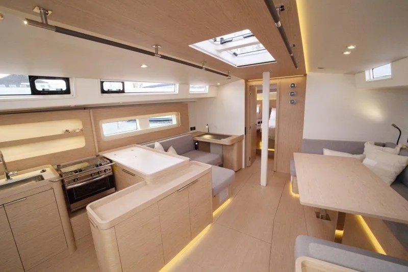  Yacht Photos Pics Luxurious interior of 2022 Beneteau Oceanis Yacht 54, featuring modern design and spacious layout.