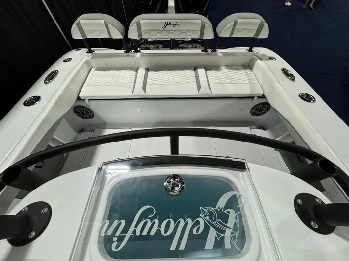  Yacht Photos Pics 2025 Yellowfin 26 Hybrid boat interior with seating and logo.