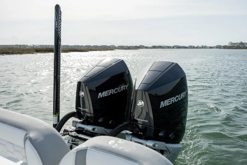  Yacht Photos Pics Twin Mercury engines on a 2025 Yellowfin 26 Hybrid boat in open water.