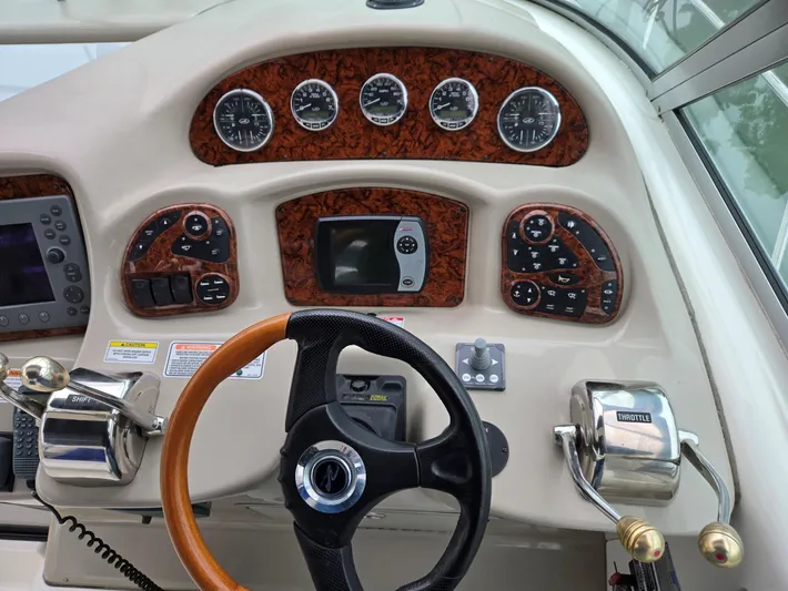 O Sea D Yacht Photos Pics Dashboard of a 2007 Sea Ray 340 Sundancer boat with gauges and controls.