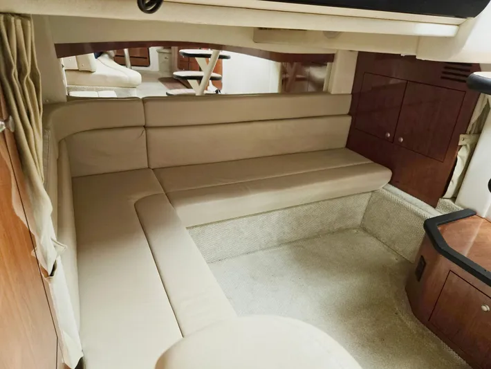 O Sea D Yacht Photos Pics Interior of 2007 Sea Ray 340 Sundancer with beige seating and wooden cabinetry.