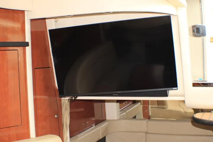 O Sea D Yacht Photos Pics Interior of 2007 Sea Ray 340 Sundancer with mounted flat-screen TV.