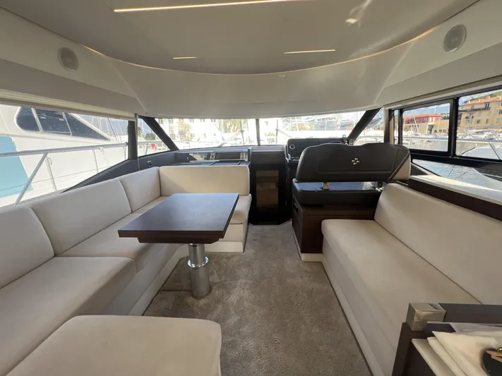  Yacht Photos Pics Luxurious interior of 2018 Prestige 460 Fly yacht with elegant seating and modern design.