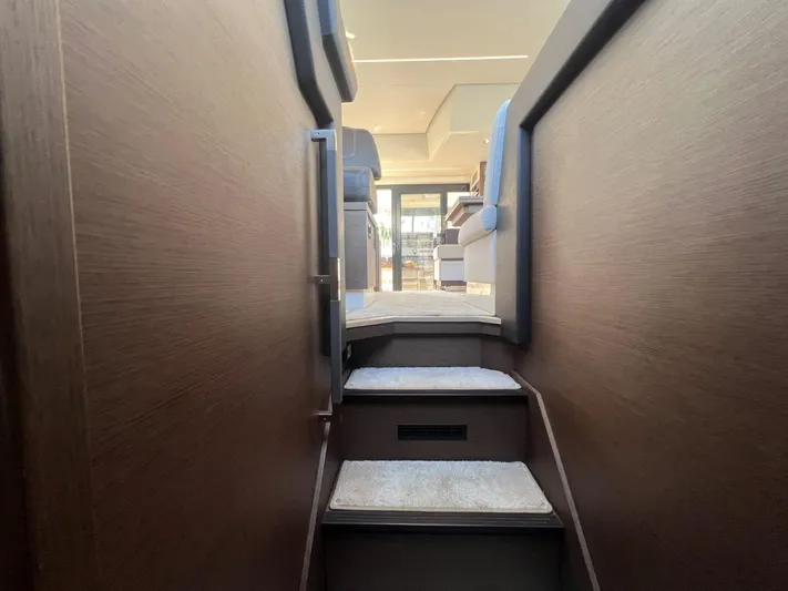  Yacht Photos Pics Staircase leading to the interior of a 2018 Prestige 460 Fly yacht.