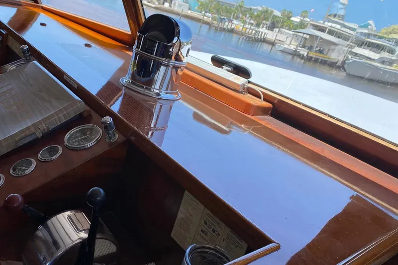 Liberty Love Yacht Photos Pics Helm of 1954 Trumpy 68 Motor Yacht with polished wood and vintage controls.
