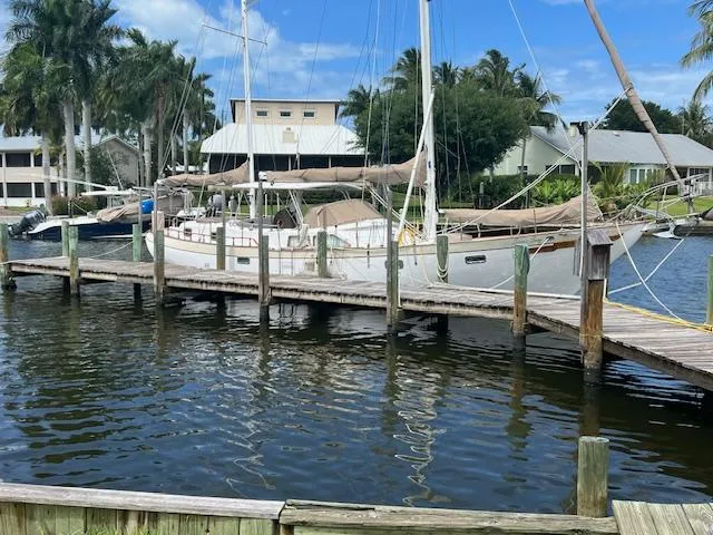 1981 Hardin Voyager 45 Ketch docked in a serene marina setting.