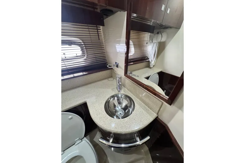 La Vie En Rose Yacht Photos Pics Luxurious bathroom interior of 2009 Sea Ray 470 Sundancer yacht with modern fixtures.