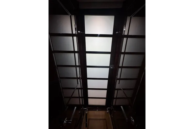 La Vie En Rose Yacht Photos Pics Ceiling view inside 2009 Sea Ray 470 Sundancer yacht, featuring modern design elements.