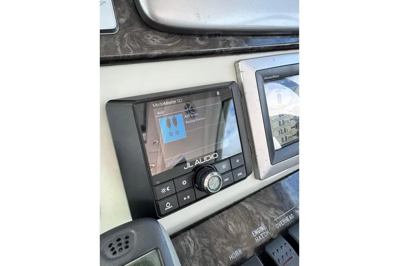 La Vie En Rose Yacht Photos Pics JL Audio MediaMaster 50 on 2009 Sea Ray 470 Sundancer dashboard.