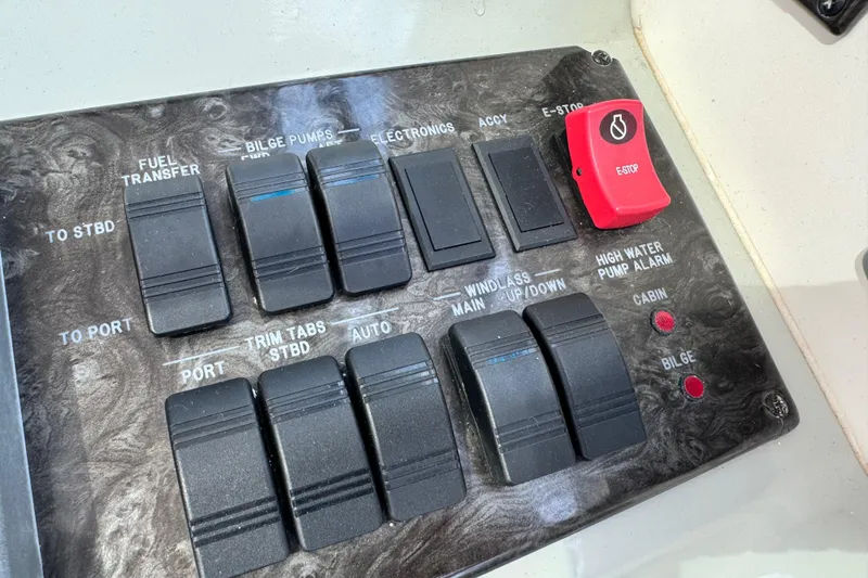 La Vie En Rose Yacht Photos Pics Control panel of a 2009 Sea Ray 470 Sundancer boat with various switches and indicators.