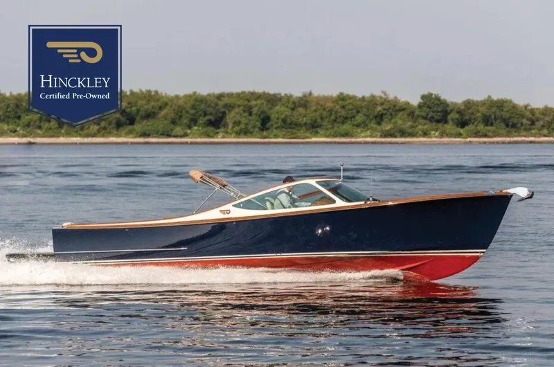 Fiveadrift Yacht Photos Pics 2003 Hinckley Talaria 29R boat cruising on water, certified pre-owned.