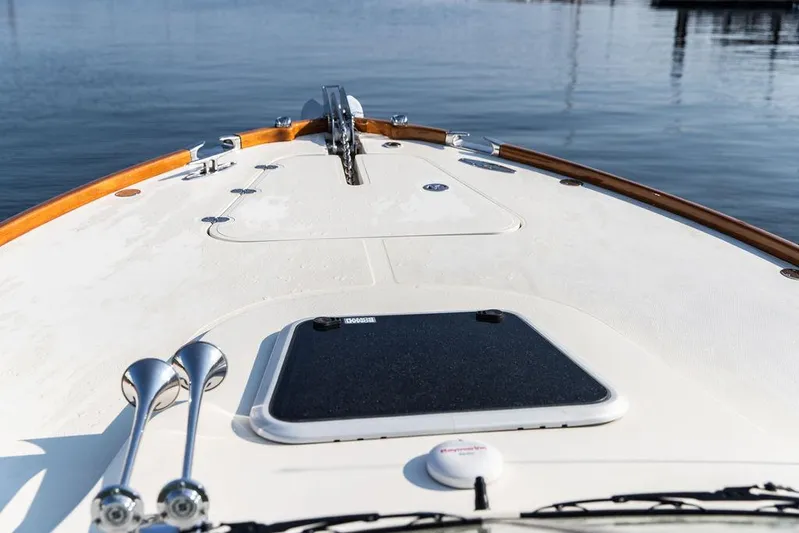 Fiveadrift Yacht Photos Pics 2003 Hinckley Talaria 29R boat deck with chrome details and wooden trim.