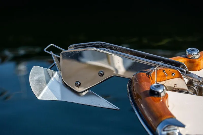 Fiveadrift Yacht Photos Pics Close-up of a 2003 Hinckley Talaria 29R boat anchor and polished wood detail.