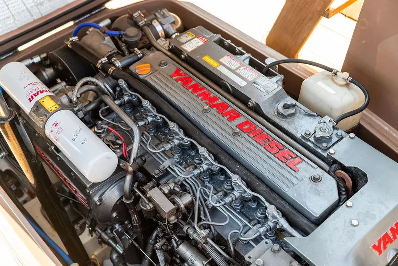 Fiveadrift Yacht Photos Pics Yanmar diesel engine in a 2003 Hinckley Talaria 29R boat, showcasing intricate components.