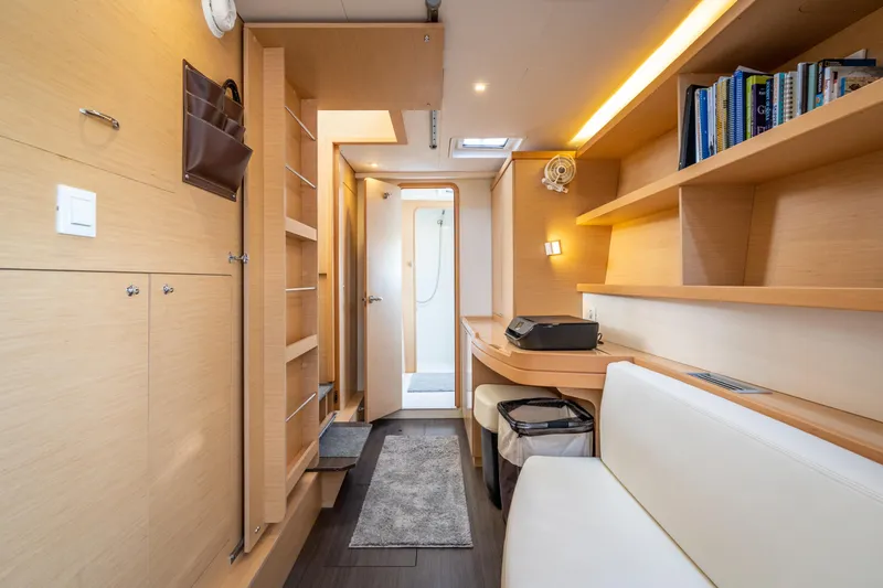 Reunited Yacht Photos Pics Interior of 2017 Lagoon 42 yacht with modern furnishings and ample storage space.