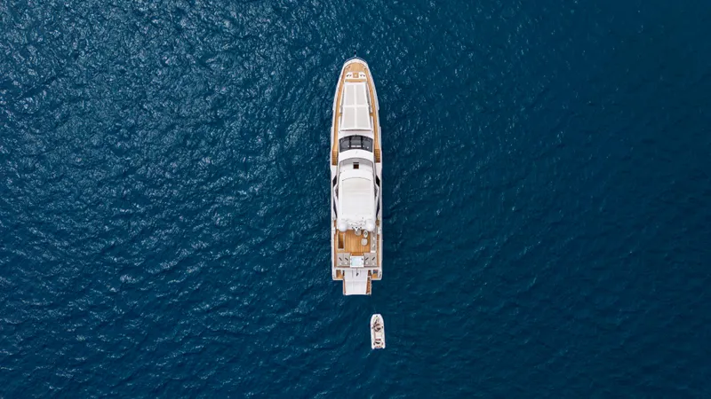  Yacht Photos Pics Aerial view of 2020 Azimut Grande 32 Metri yacht on deep blue ocean.