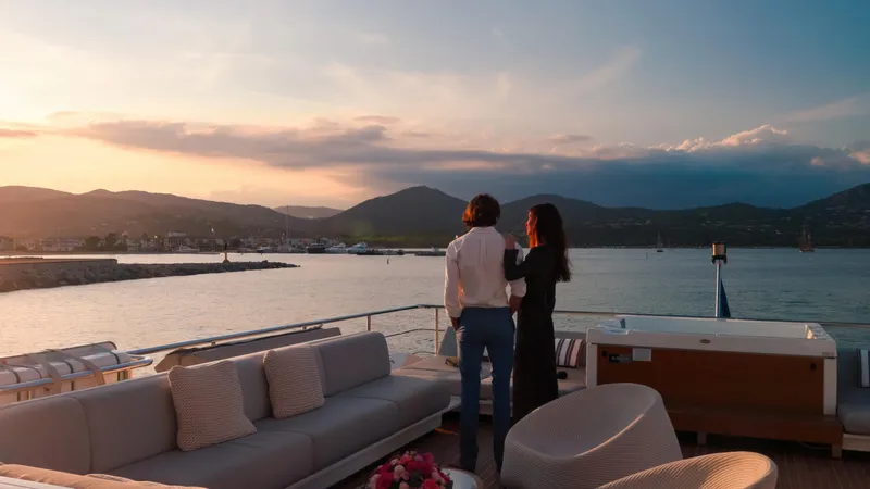  Yacht Photos Pics Couple enjoying sunset on Azimut Grande 32 Metri yacht, 2020 model, with scenic ocean view.