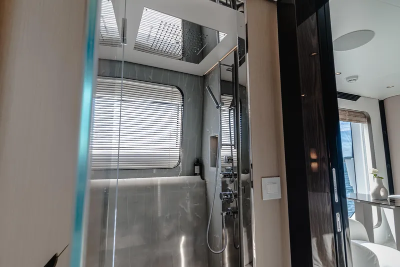  Yacht Photos Pics Luxurious bathroom interior of 2020 Azimut Grande 32 Metri yacht with modern fixtures.