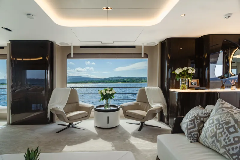  Yacht Photos Pics Luxurious interior of 2020 Azimut Grande 32 Metri yacht with elegant seating and ocean view.