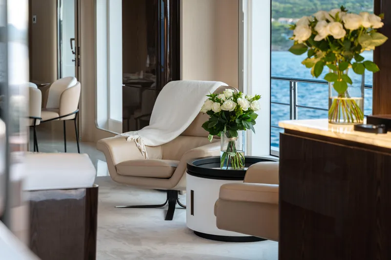  Yacht Photos Pics Luxurious interior of 2020 Azimut Grande 32 Metri yacht with elegant seating and floral decor.