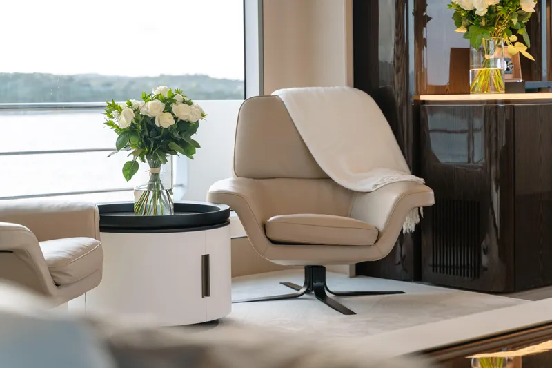  Yacht Photos Pics Luxurious interior of 2020 Azimut Grande 32 Metri yacht with elegant seating and floral decor.