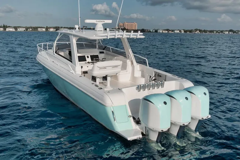  Yacht Photos Pics 2008 Intrepid 390 Sport Yacht on open water, featuring triple outboard engines.