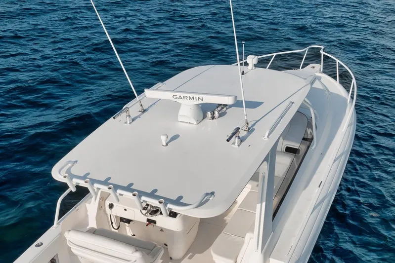  Yacht Photos Pics 2008 Intrepid 390 Sport Yacht on open water, featuring Garmin equipment.