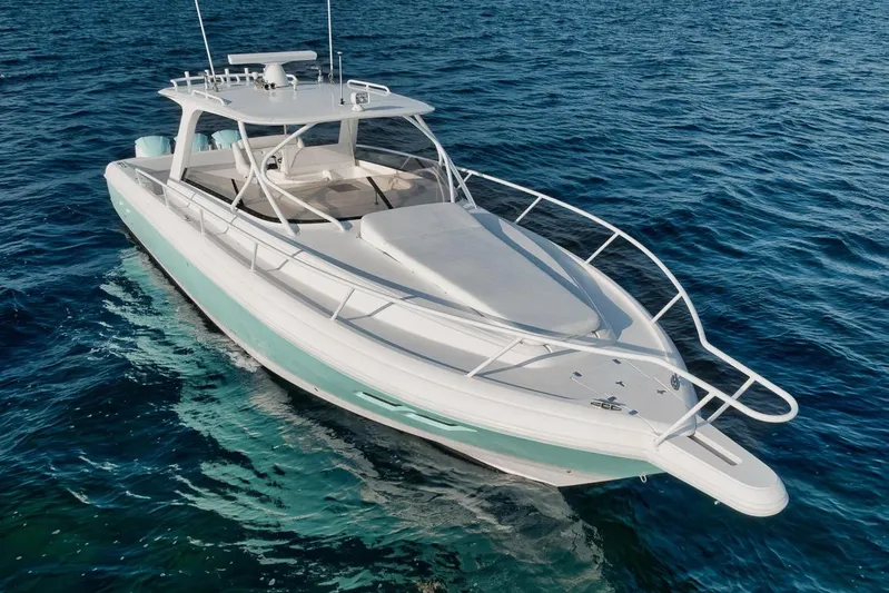  Yacht Photos Pics 2008 Intrepid 390 Sport Yacht cruising on open blue waters.