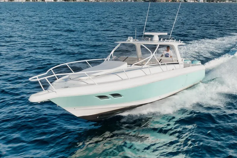  Yacht Photos Pics 2008 Intrepid 390 Sport Yacht cruising on open water.