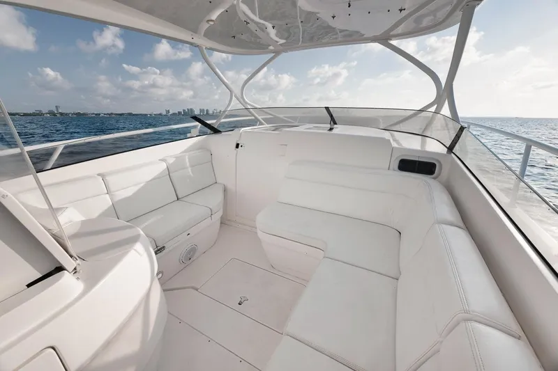  Yacht Photos Pics Luxurious 2008 Intrepid 390 Sport Yacht interior with white seating, ocean view.