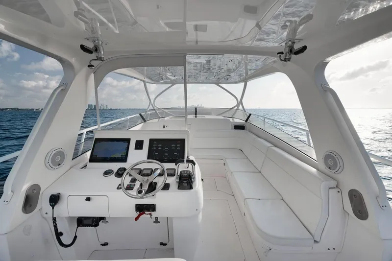  Yacht Photos Pics 2008 Intrepid 390 Sport Yacht interior with modern helm, white seating, and ocean view.