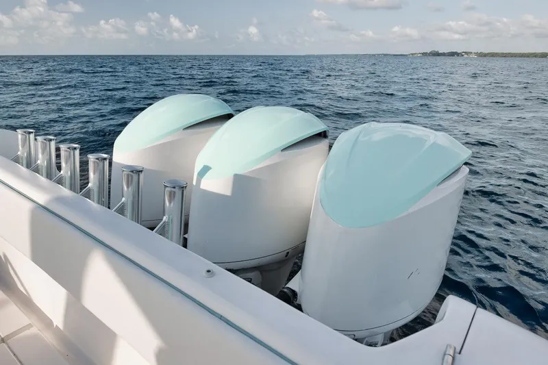  Yacht Photos Pics 2008 Intrepid 390 Sport Yacht with triple outboard engines on open sea.