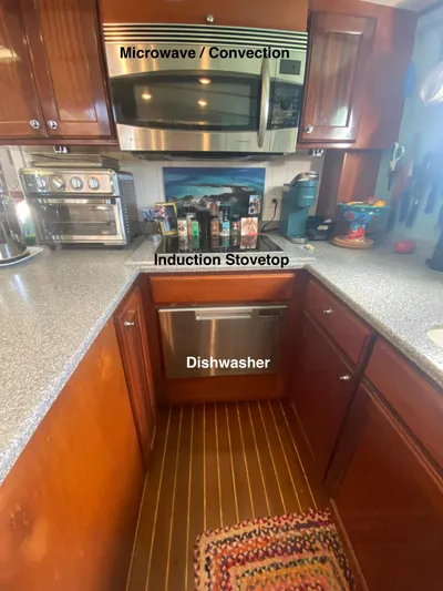 Korkzcrew Yacht Photos Pics 2008 Great Harbour N37 kitchen with microwave, induction stovetop, and dishwasher.