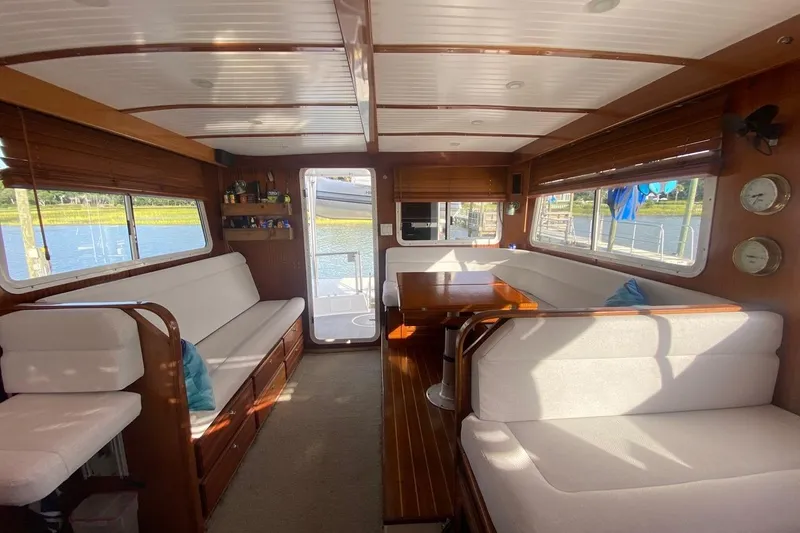 Korkzcrew Yacht Photos Pics Interior of 2008 Great Harbour N37 yacht with spacious seating and wooden accents.