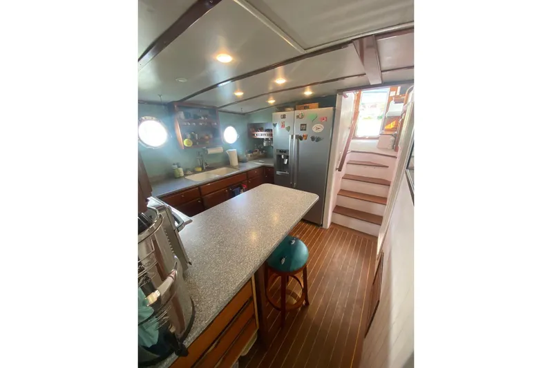 Korkzcrew Yacht Photos Pics 2008 Great Harbour N37 yacht kitchen with modern appliances and wooden cabinetry.