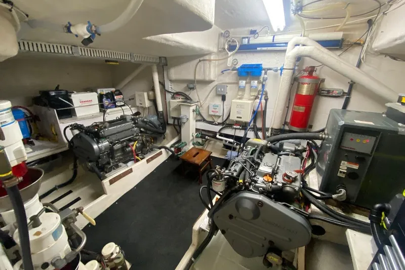 Korkzcrew Yacht Photos Pics Engine room of 2008 Great Harbour N37 boat, featuring Yanmar engines and various equipment.
