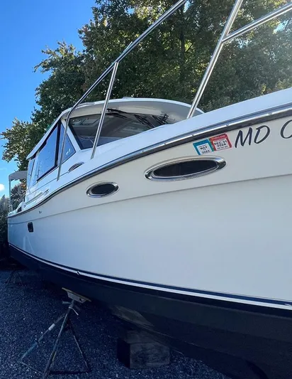  Yacht Photos Pics 2016 Cutwater C-28 boat on stands, side view, outdoors.