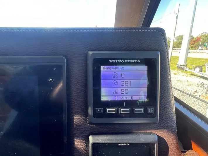  Yacht Photos Pics Volvo Penta display on 2016 Cutwater C-28 boat dashboard, showing engine data.