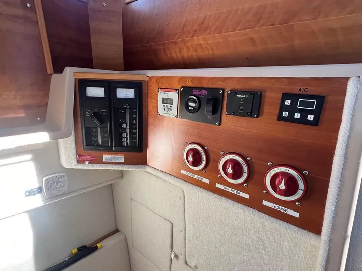  Yacht Photos Pics Control panel of a 2016 Cutwater C-28 boat with switches and gauges.