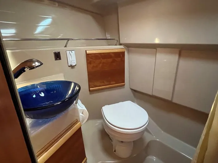  Yacht Photos Pics 2016 Cutwater C-28 boat bathroom with modern sink and toilet.