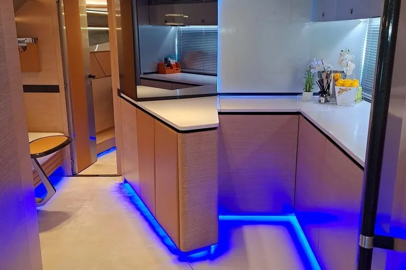 M/y Catch Me Yacht Photos Pics Luxurious interior of 2010 Otam 58 yacht with modern lighting and sleek design.